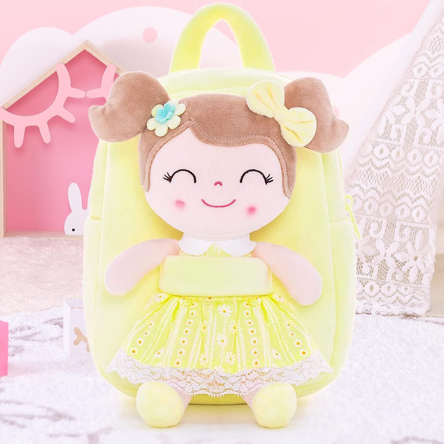 Gloveleya mochila amarilla con muñeca
